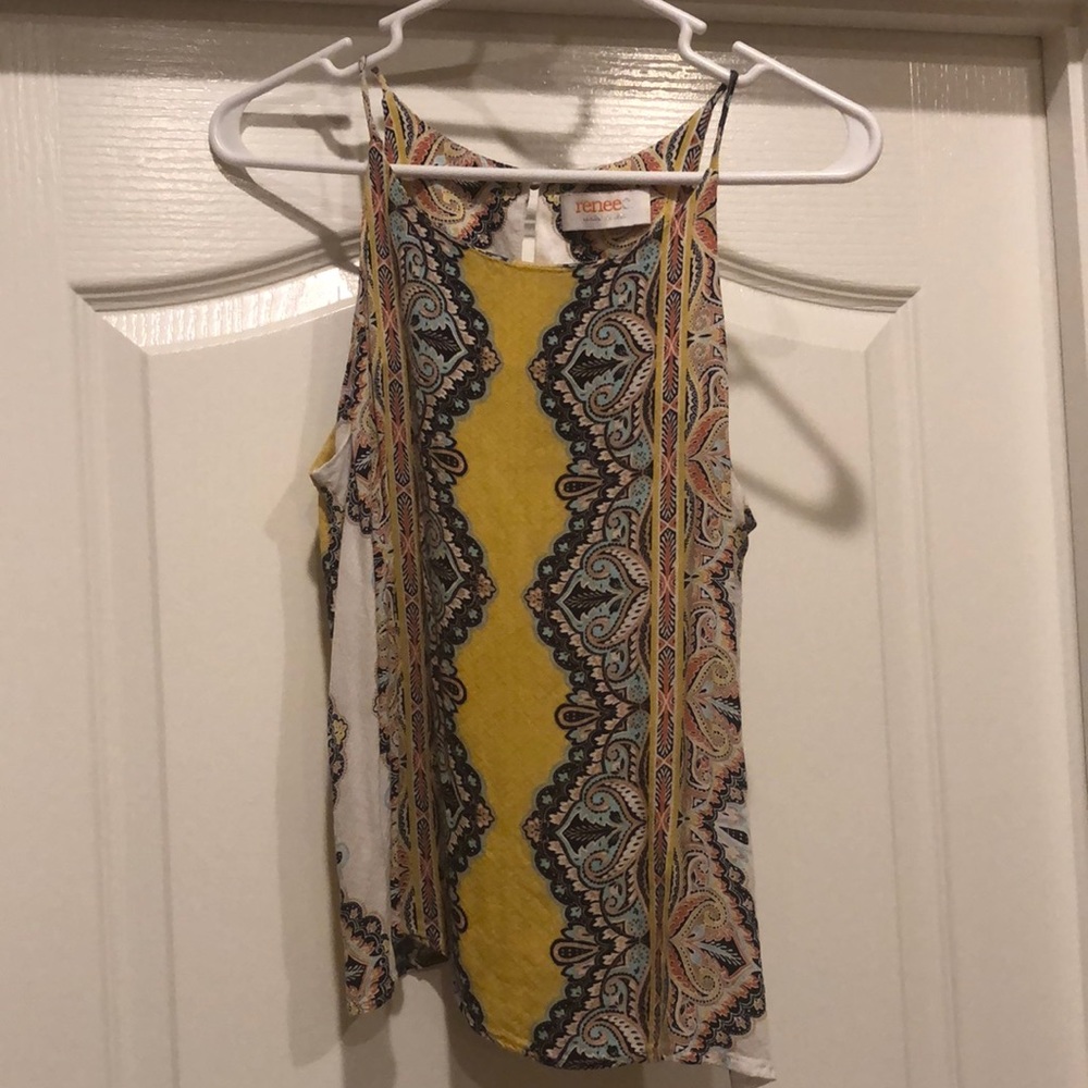 Renee C. Small tank top with detailed design.